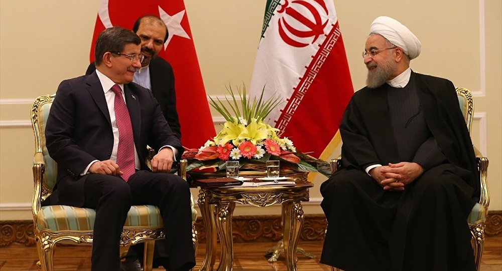 Başbakan Davutoğlu, Ruhani ile bir araya geldi