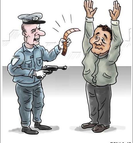 Karikatür – Amerikan Polisi’nin suçluyu suçsuzdan ayırt etme yöntemi!